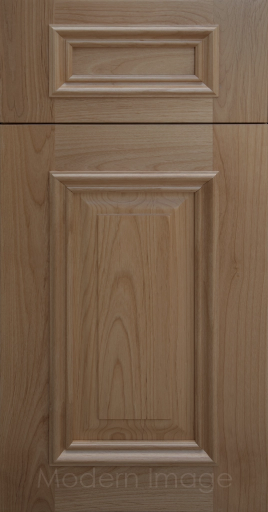 Heritage custom cabinets in a Fawn Stain, classic raised panel doors, and modern flat slab drawer fronts.